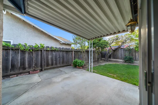 a view of backyard with green space