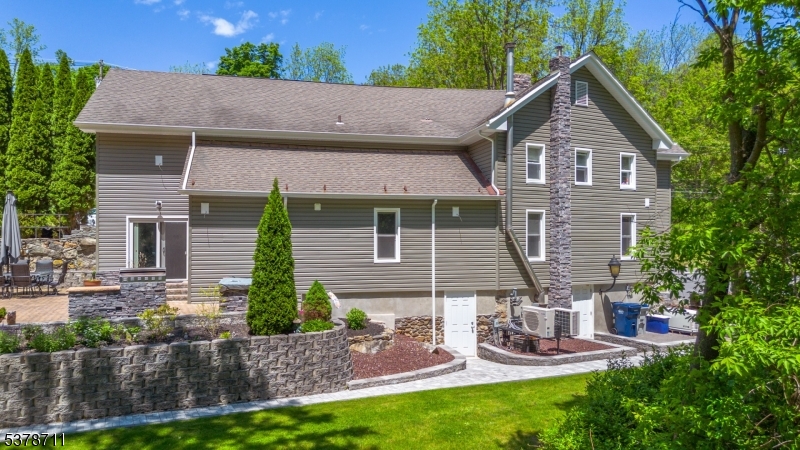 1856 Rt565, Unit 1 Glenwood, NJ 07418 - Photo 15 of 20 a front view of house with yard and green space
