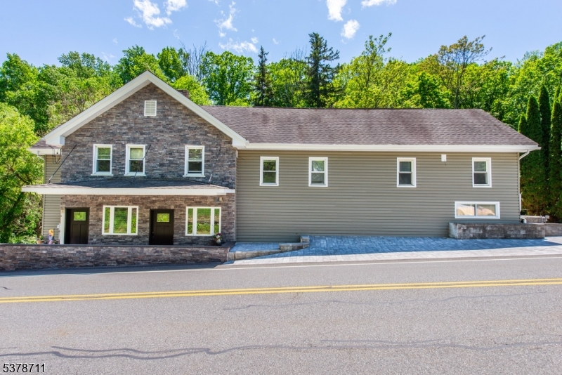 1856 Rt565, Unit 1 Glenwood, NJ 07418 - Photo 17 of 20 front view of a house with a yard