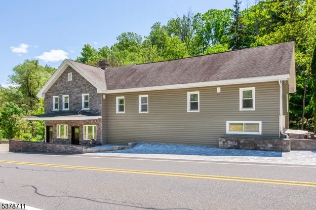 a house view with a garden space