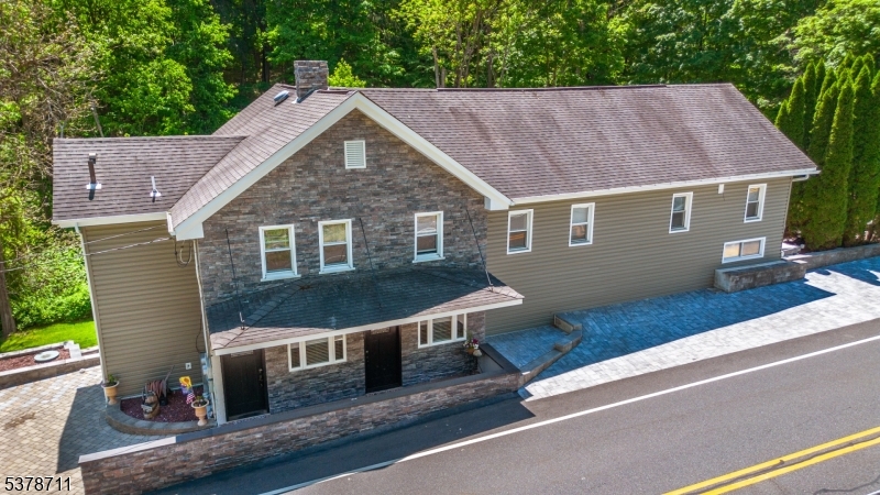 1856 Rt565, Unit 1 Glenwood, NJ 07418 - Photo 19 of 20 a view of a house with a yard