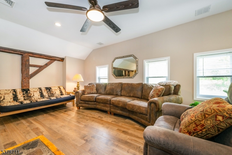 1856 Rt565, Unit 1 Glenwood, NJ 07418 - Photo 4 of 20 a living room with furniture and a large window