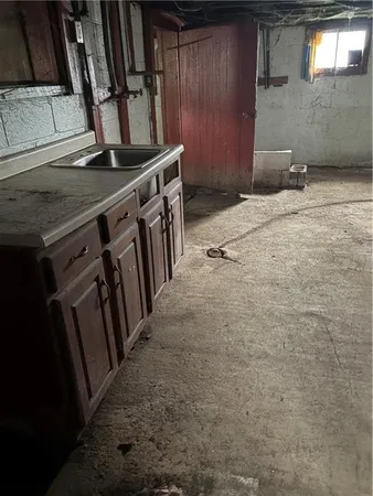 a view of storage and utility room