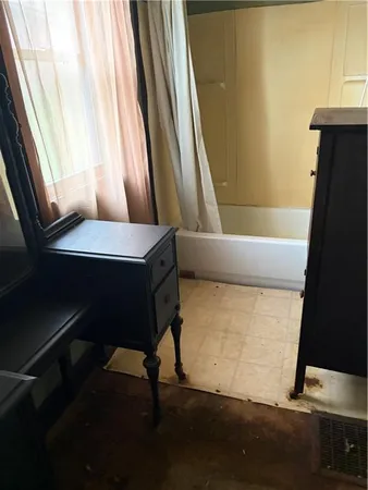 a view of a bathtub in a room
