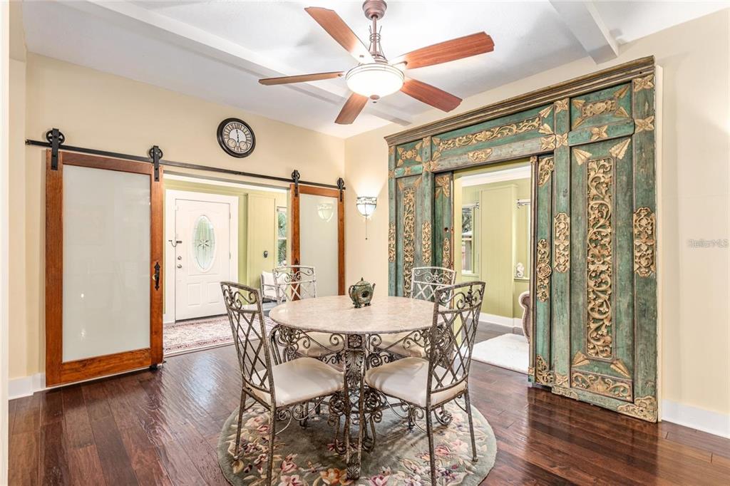 44 Southeast 8th Court Ocala, FL 34471 - Photo 24 of 87 a view of a dining room with furniture window and wooden floor