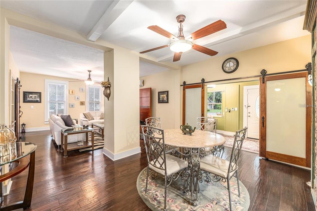 44 Southeast 8th Court Ocala, FL 34471 - Photo 25 of 87 a view of a dining room with furniture window and wooden floor