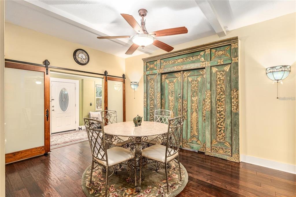 44 Southeast 8th Court Ocala, FL 34471 - Photo 26 of 87 a dining room with furniture window and wooden floor