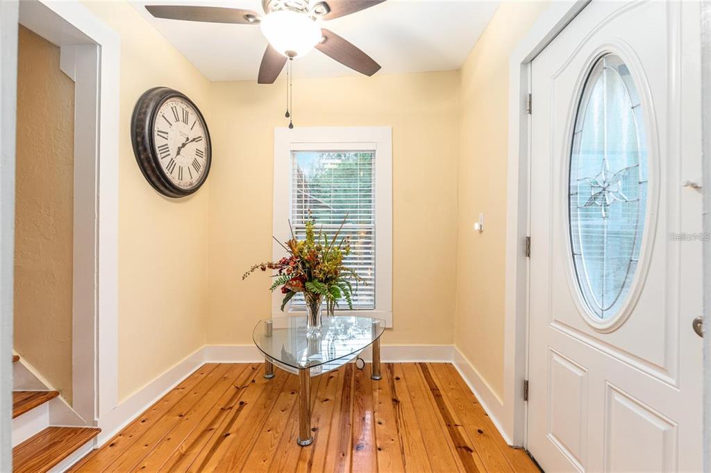 44 Southeast 8th Court Ocala, FL 34471 - Photo 46 of 87 a view of a entryway with wooden floor
