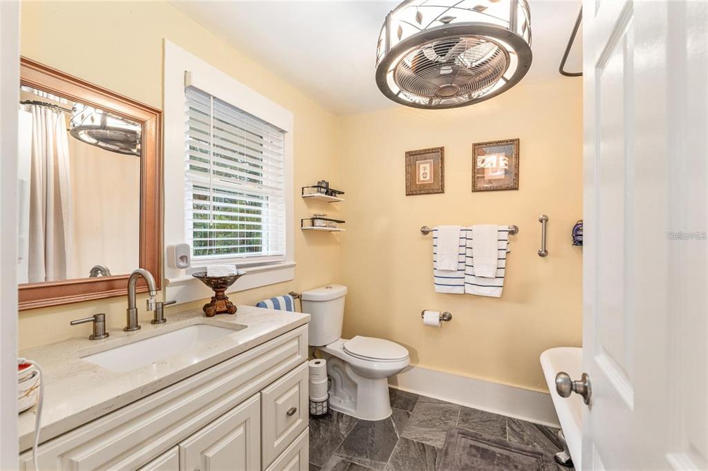 44 Southeast 8th Court Ocala, FL 34471 - Photo 51 of 87 a bathroom with a sink a toilet and a window