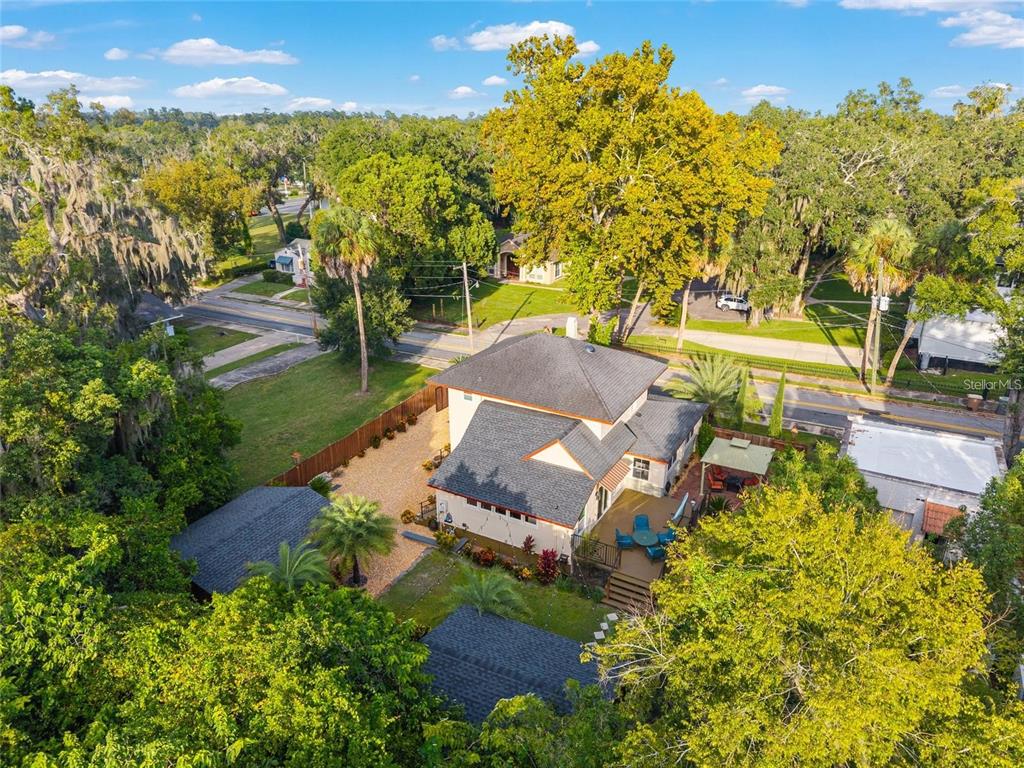 44 Southeast 8th Court Ocala, FL 34471 - Photo 81 of 87 an aerial view of a house with a yard and lake view