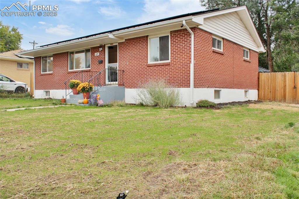 609 Placid Road Colorado Springs, CO 80910 - Photo 27 of 28 a view of a backyard of the house