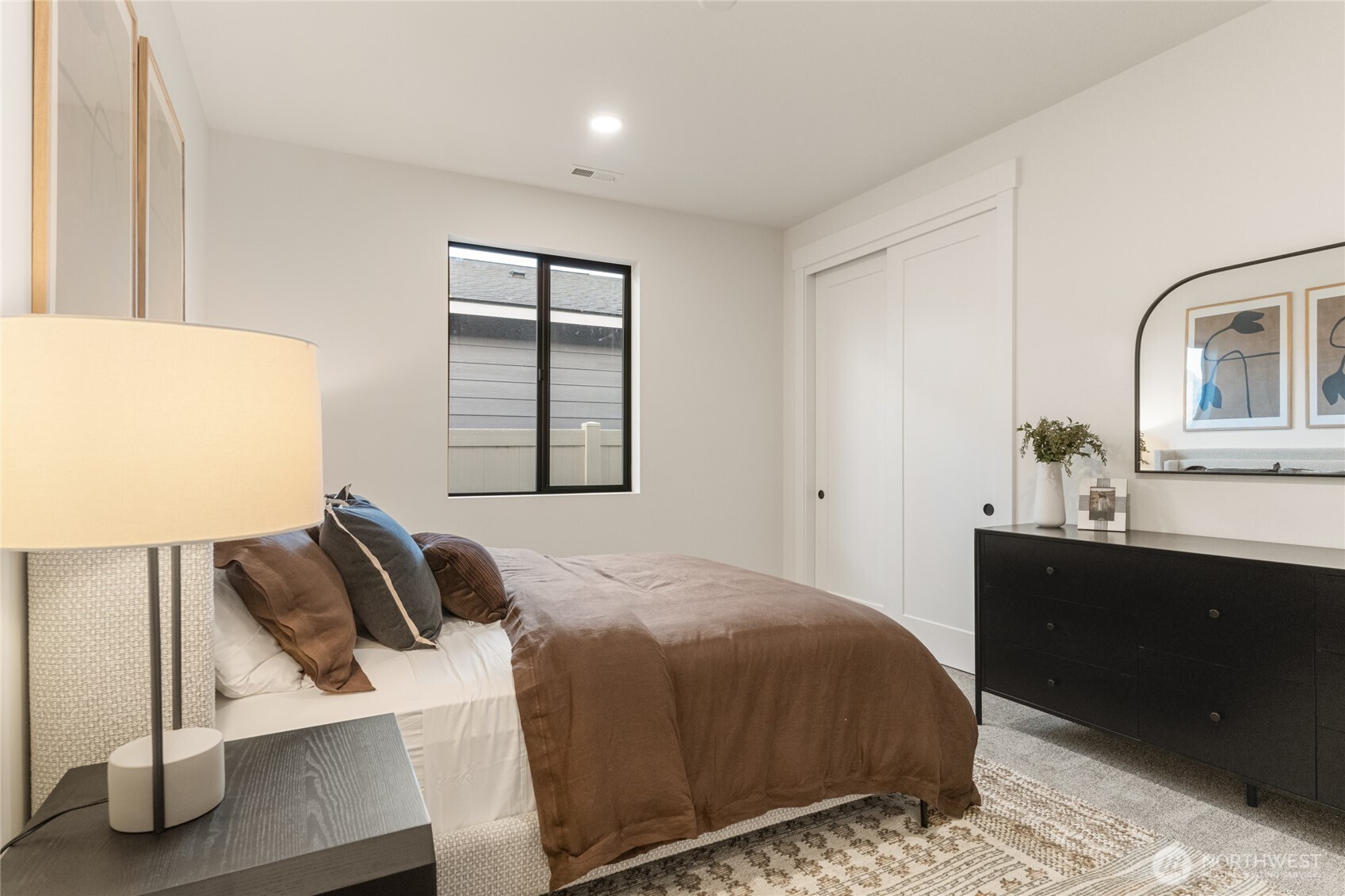 550 South Oasis Loop East Wenatchee, WA 98802 - Photo 32 of 36 a bedroom with a bed and dresser