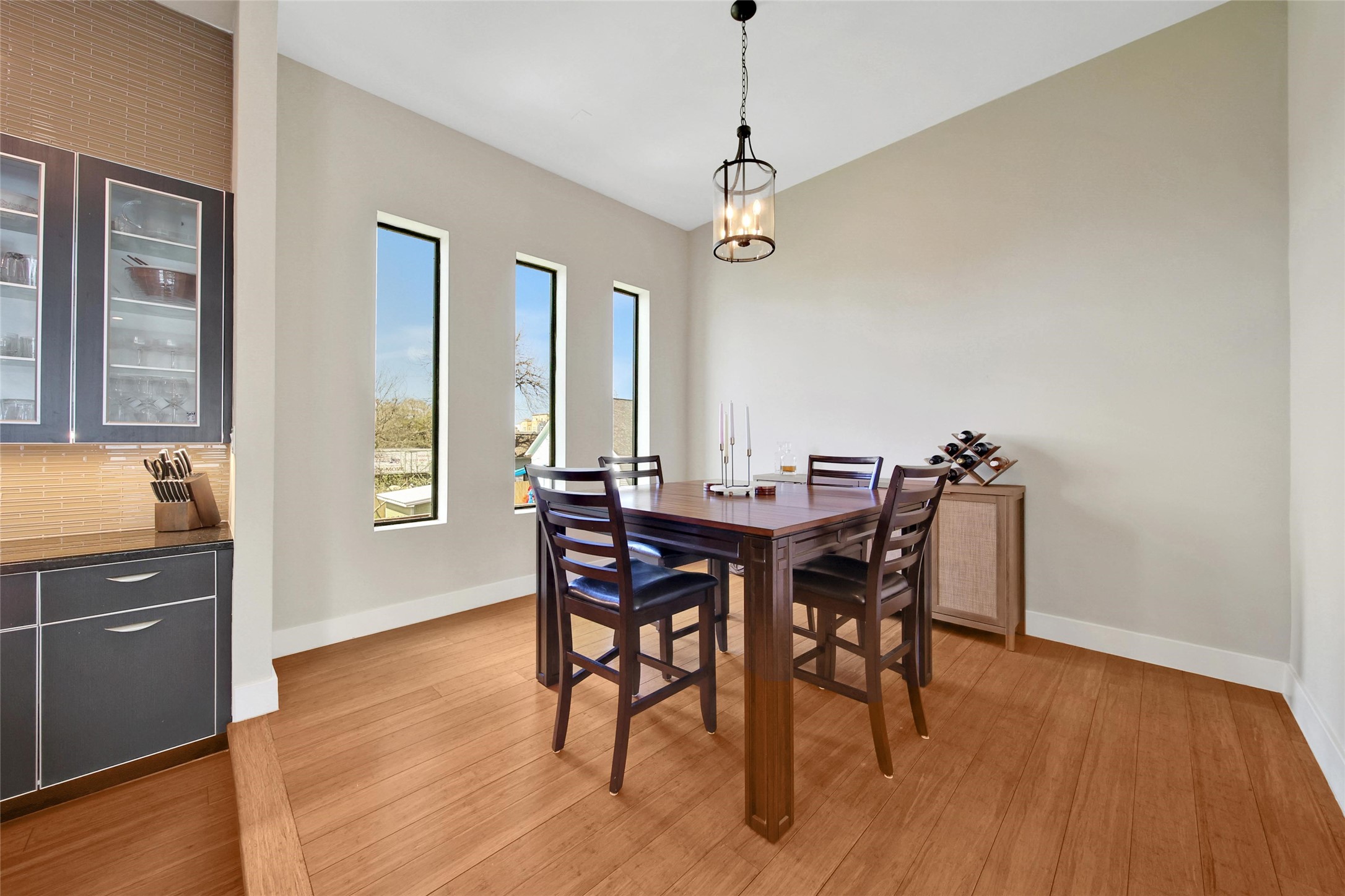 1407 Hickory Street Houston, TX 77007 - Photo 14 of 38 a view of a dining room with furniture window and wooden floor