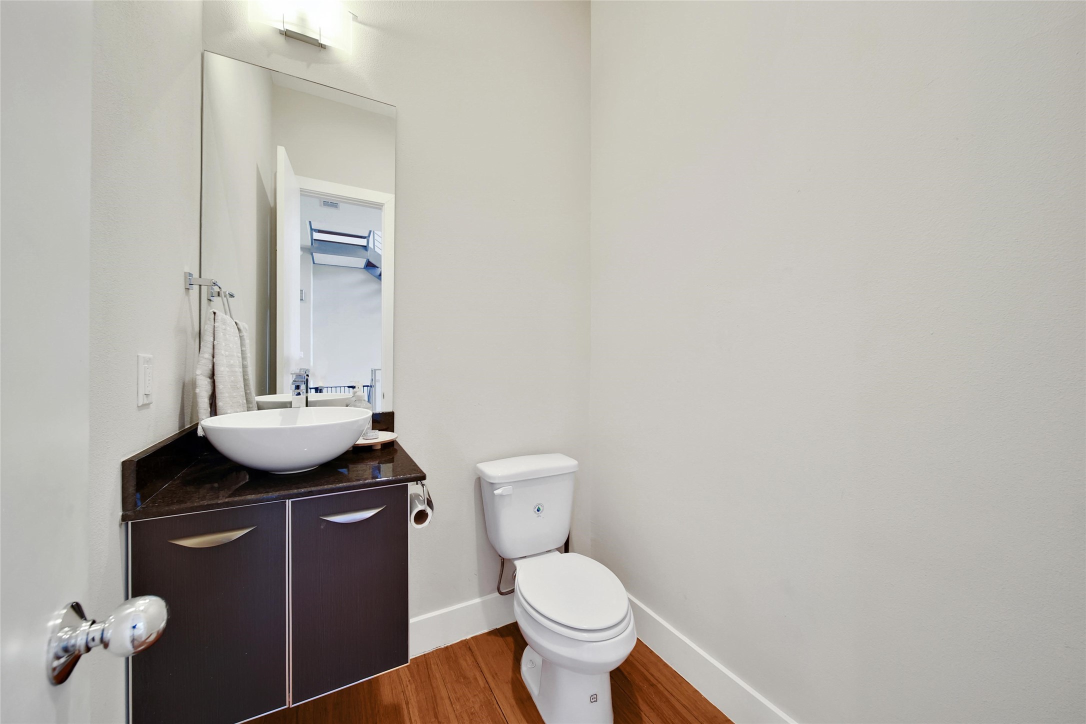 1407 Hickory Street Houston, TX 77007 - Photo 15 of 38 a bathroom with a granite countertop toilet and sink