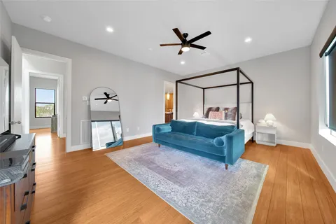 a bathroom with a double vanity sink a mirror and a shower