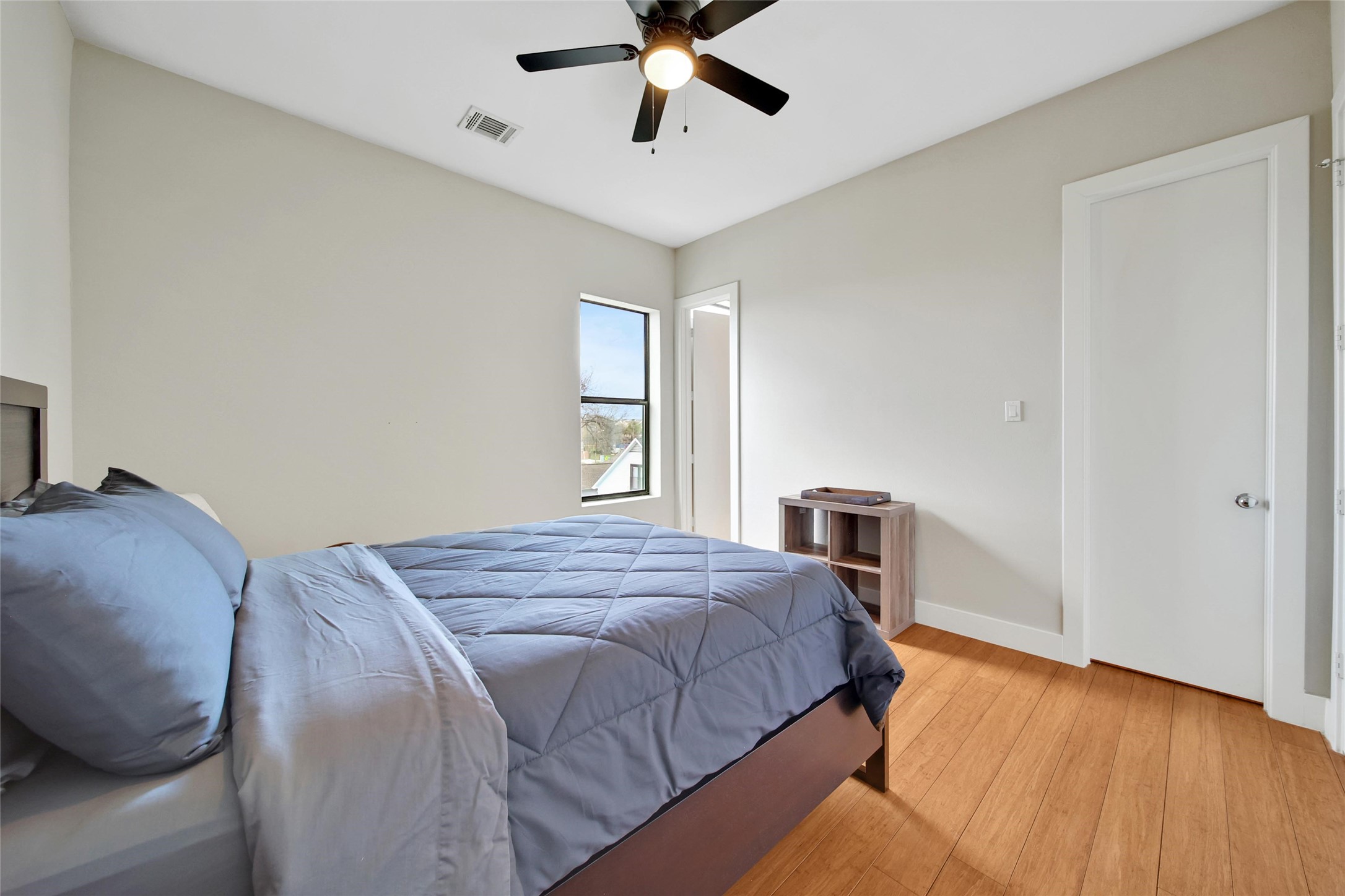 1407 Hickory Street Houston, TX 77007 - Photo 23 of 38 a bedroom with a bed and window