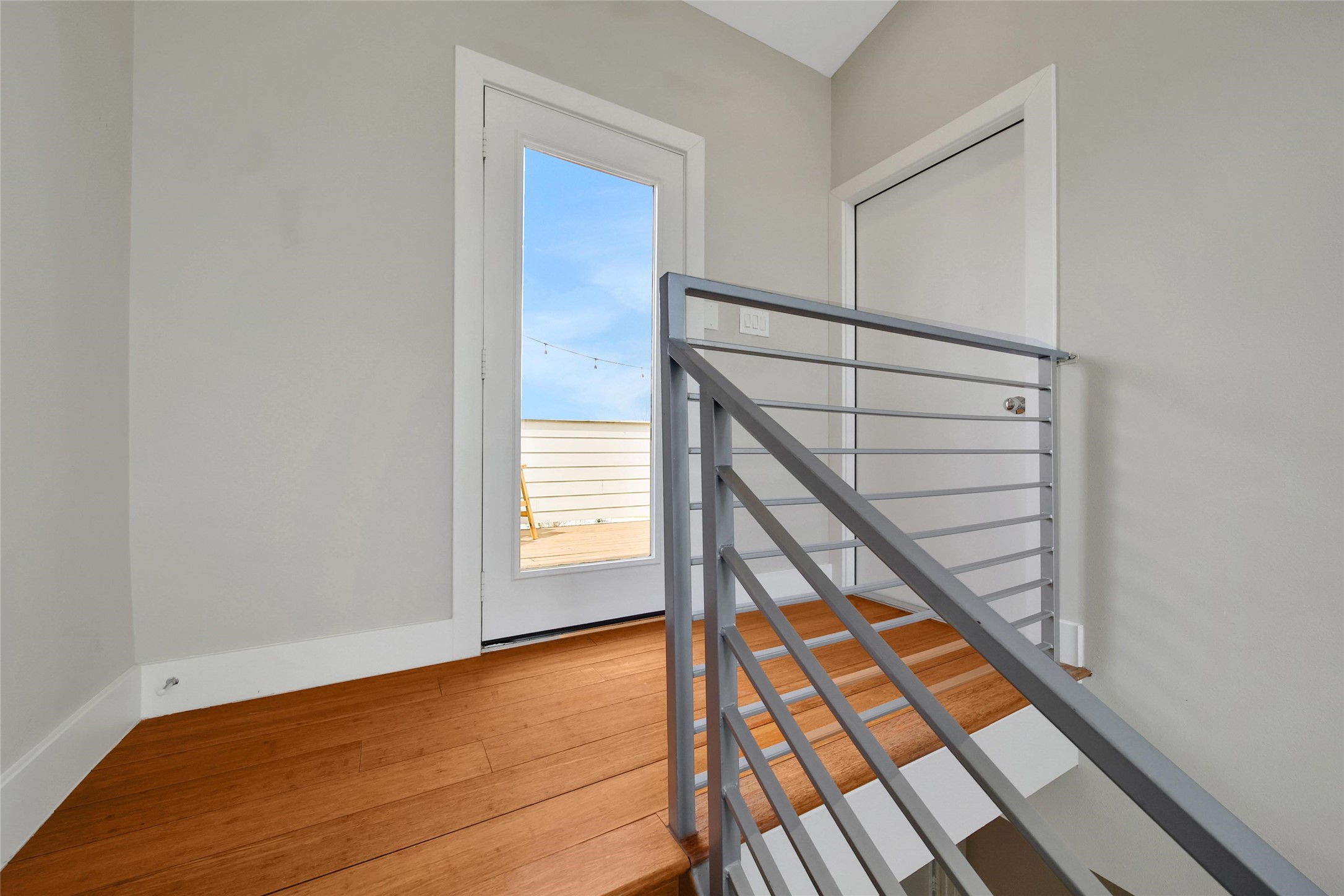 1407 Hickory Street Houston, TX 77007 - Photo 27 of 38 a view of entryway with wooden floor
