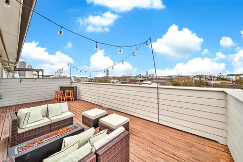 a balcony with a couch