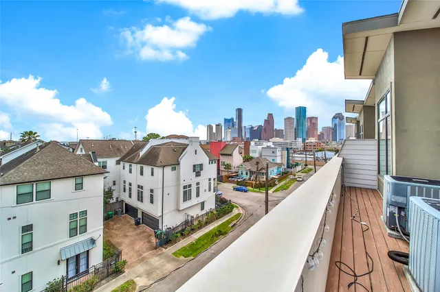 a view of a city from a balcony