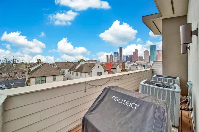 a workspace with furniture and screen