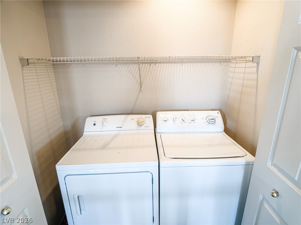 228 Positive Point Street Henderson, NV 89012 - Photo 20 of 27 A dedicated laundry closet offers convenient in-home appliance access and overhead storage.