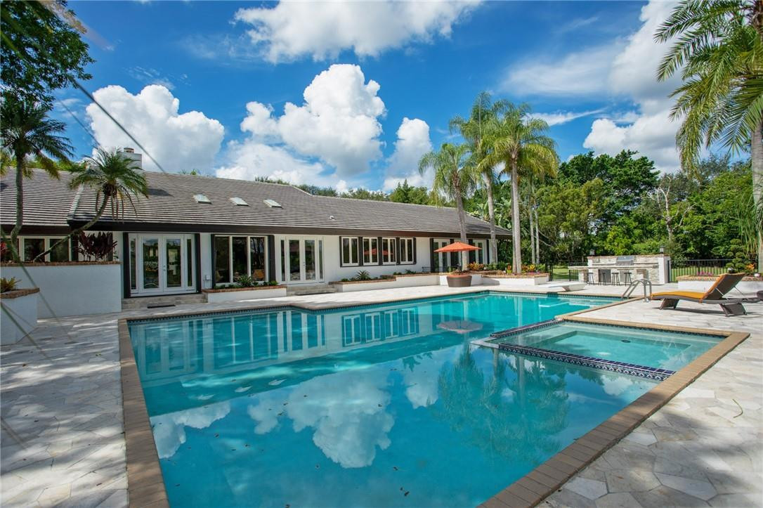 2665 Hackney Road Weston, FL 33331 - Photo 3 of 46 a view of a house with swimming pool