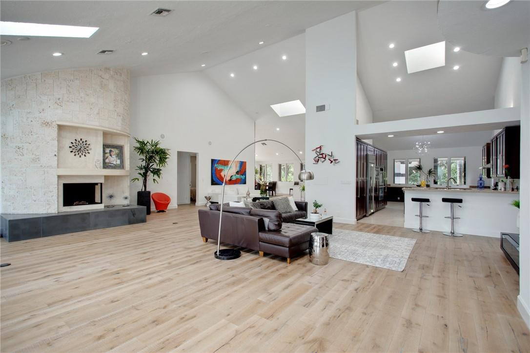 2665 Hackney Road Weston, FL 33331 - Photo 5 of 46 a living room with furniture and a fireplace