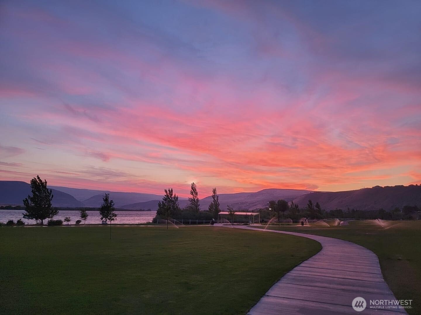 a view of a city with sunset view
