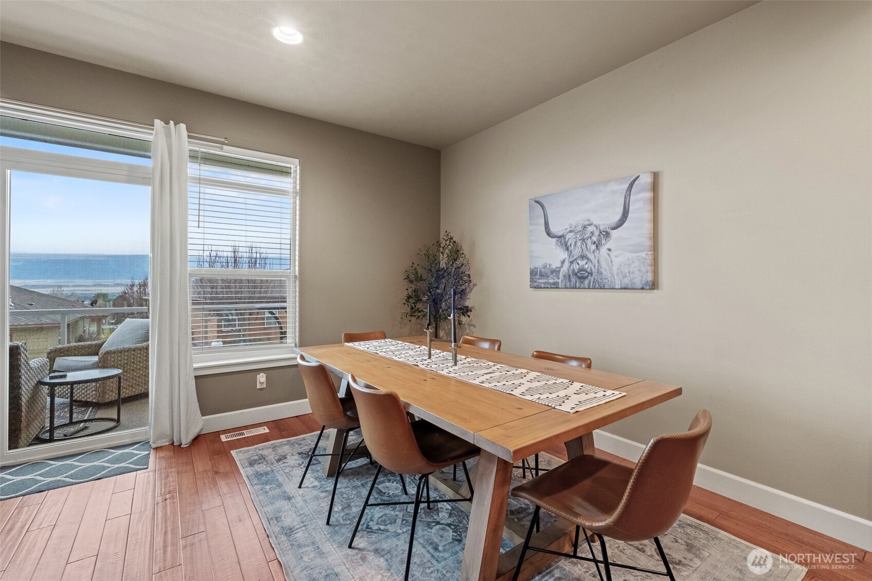 23325 Sunserra Loop, Unit A44 Quincy, WA 98848 - Photo 11 of 34 a view of a dining room with furniture window and wooden floor