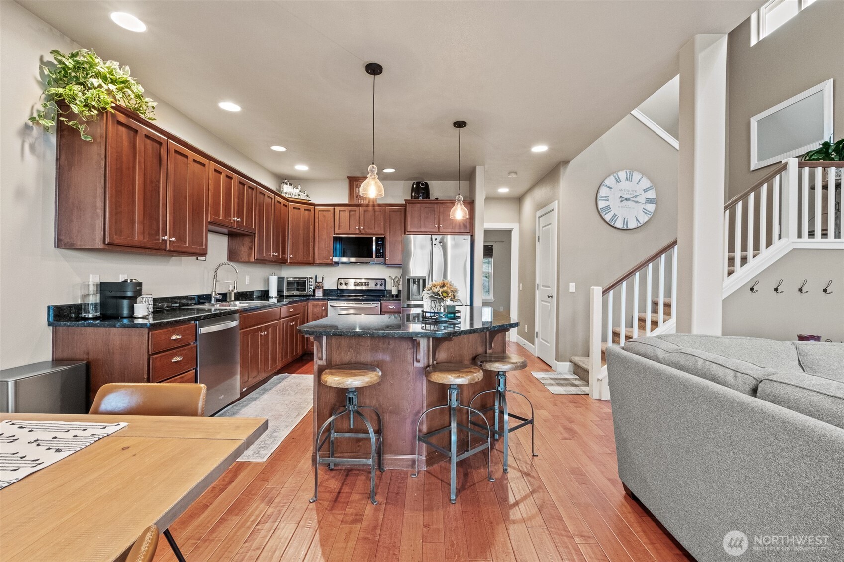 23325 Sunserra Loop, Unit A44 Quincy, WA 98848 - Photo 12 of 34 a large kitchen with a table and chairs