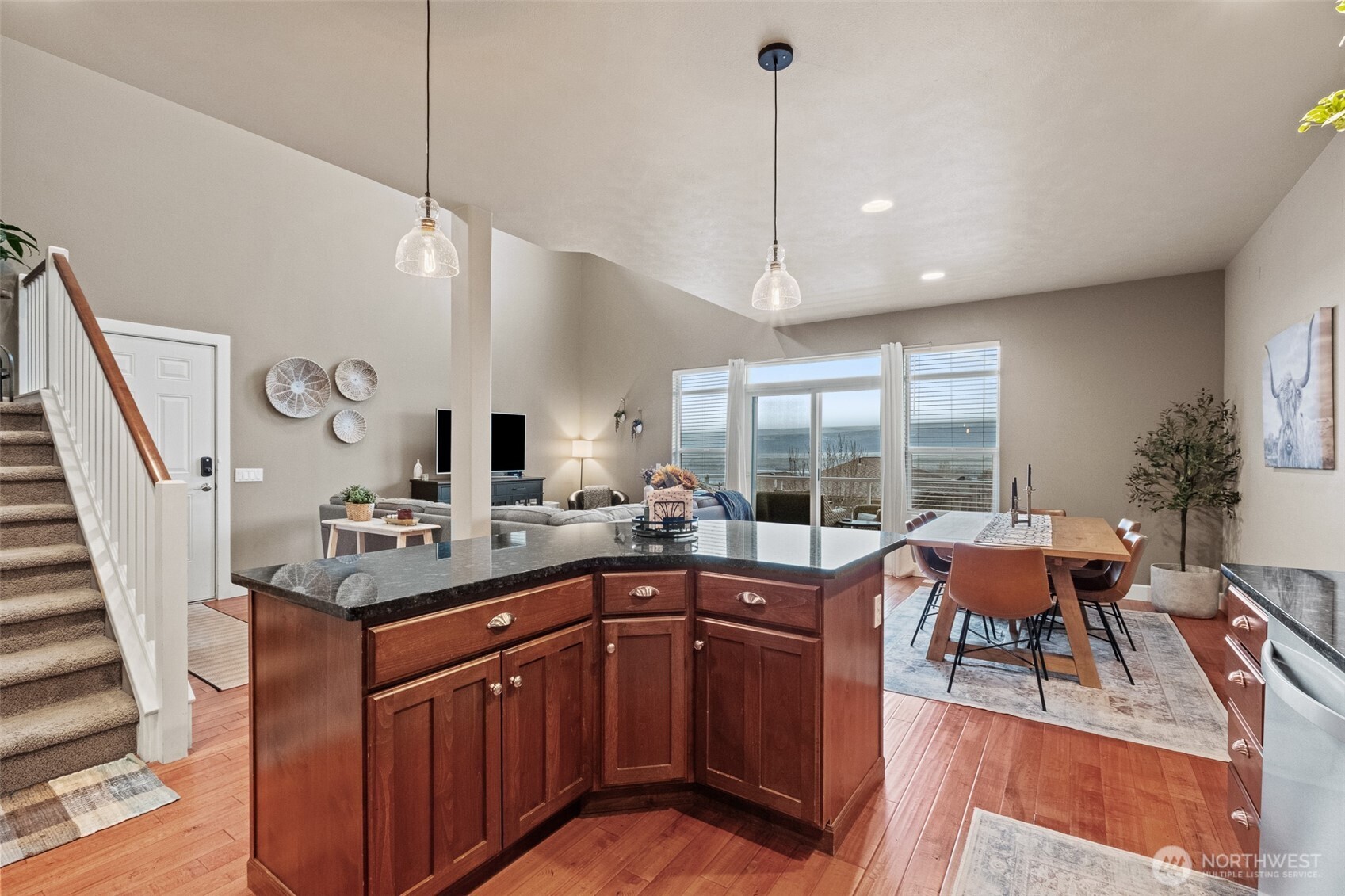23325 Sunserra Loop, Unit A44 Quincy, WA 98848 - Photo 13 of 34 a kitchen with stainless steel appliances granite countertop sink stove and wooden floor
