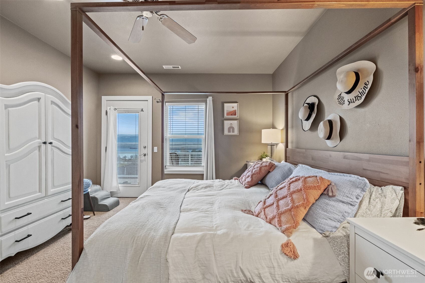 23325 Sunserra Loop, Unit A44 Quincy, WA 98848 - Photo 17 of 34 a bedroom with a large bed and a chandelier