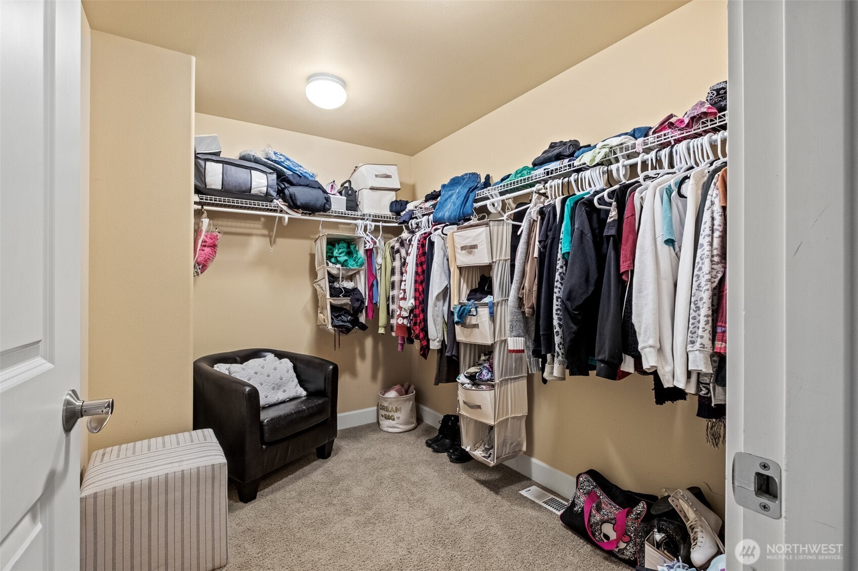 23325 Sunserra Loop, Unit A44 Quincy, WA 98848 - Photo 22 of 34 a view of walk in closet with clothes and shoes