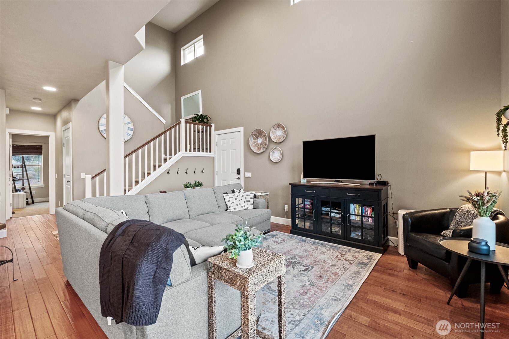 23325 Sunserra Loop, Unit A44 Quincy, WA 98848 - Photo 7 of 34 a living room with furniture and a flat screen tv