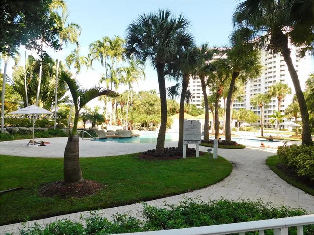a city view with palm trees