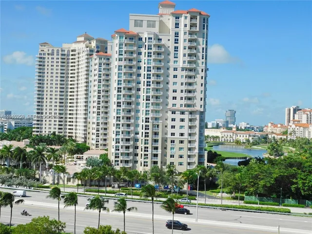 a view of a city with tall buildings