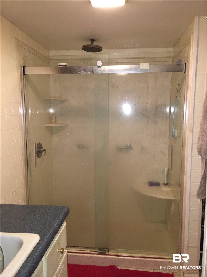 8305 Barrie Drive Theodore, AL 36582 - Photo 8 of 20 This renovated bath is on the 2 bed/1 bath side