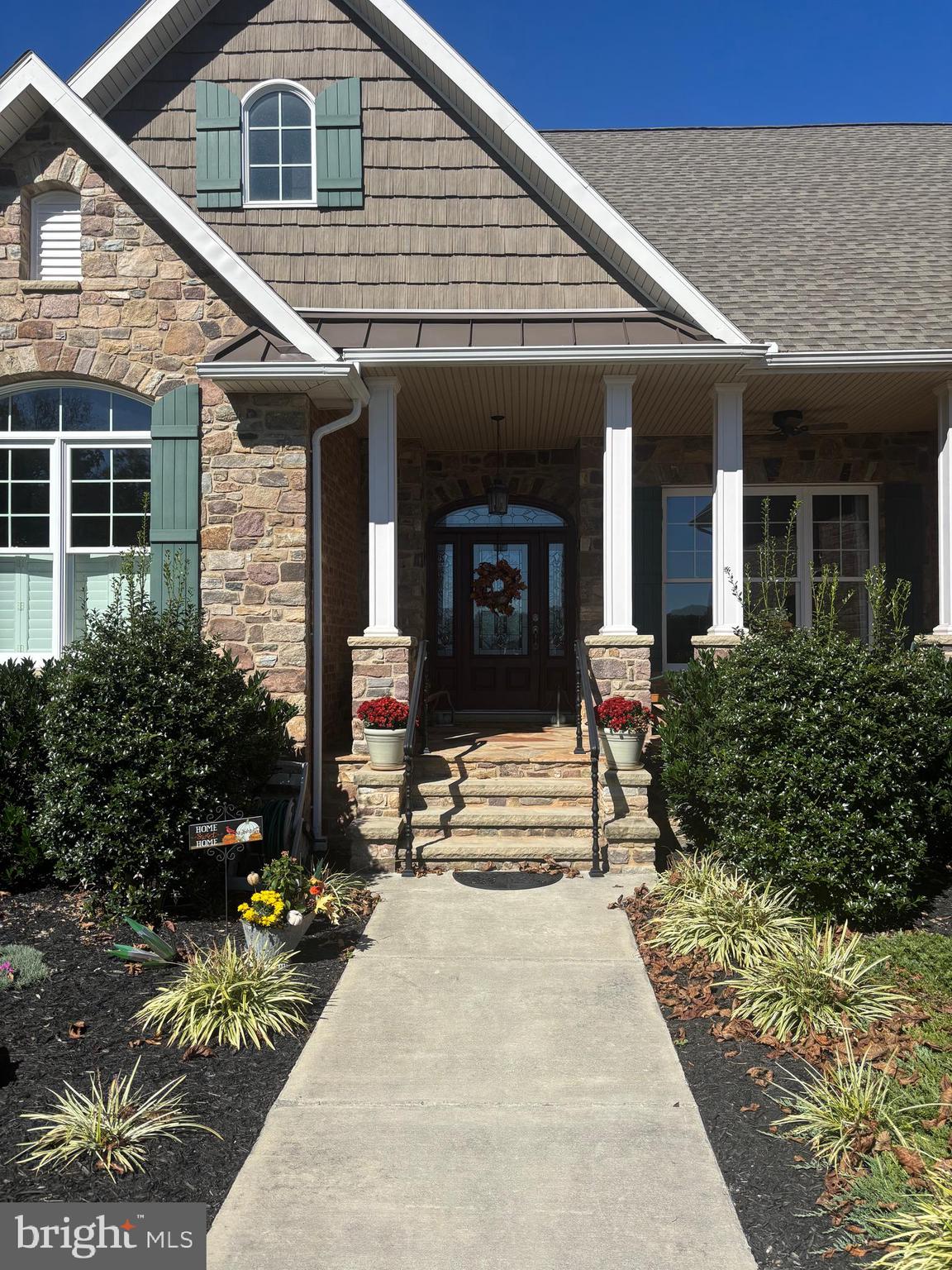 140 West Reynolds Road New Oxford, PA 17350 - Photo 15 of 132 a front view of a house with a porch