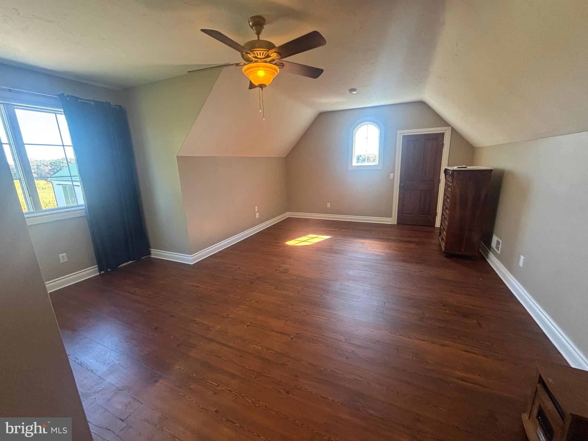 140 West Reynolds Road New Oxford, PA 17350 - Photo 58 of 132 an empty room with wooden floor and windows