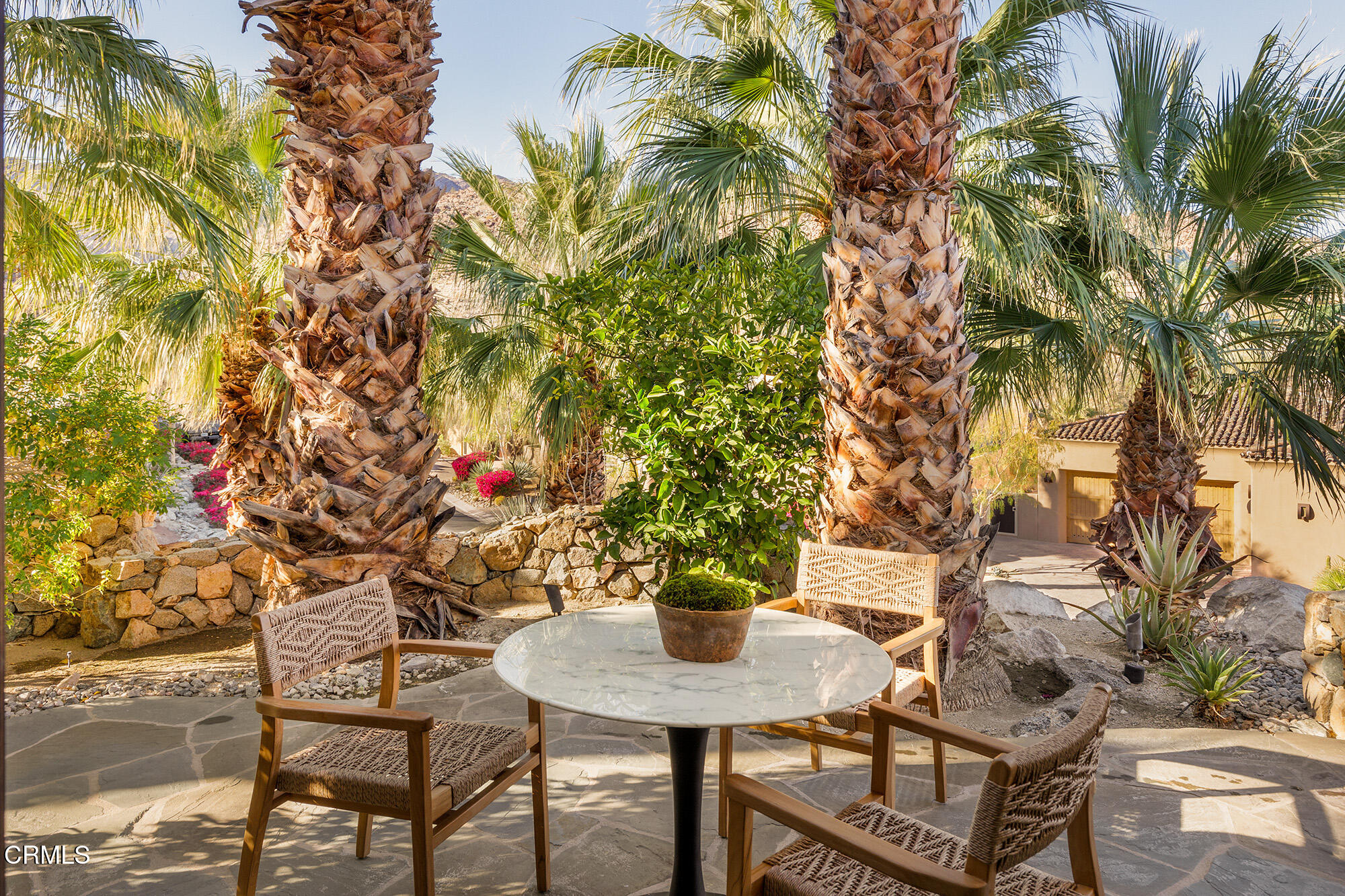 72265 Bajada Trail Palm Desert, CA 92260 - Photo 16 of 25 a table and chairs in a patio