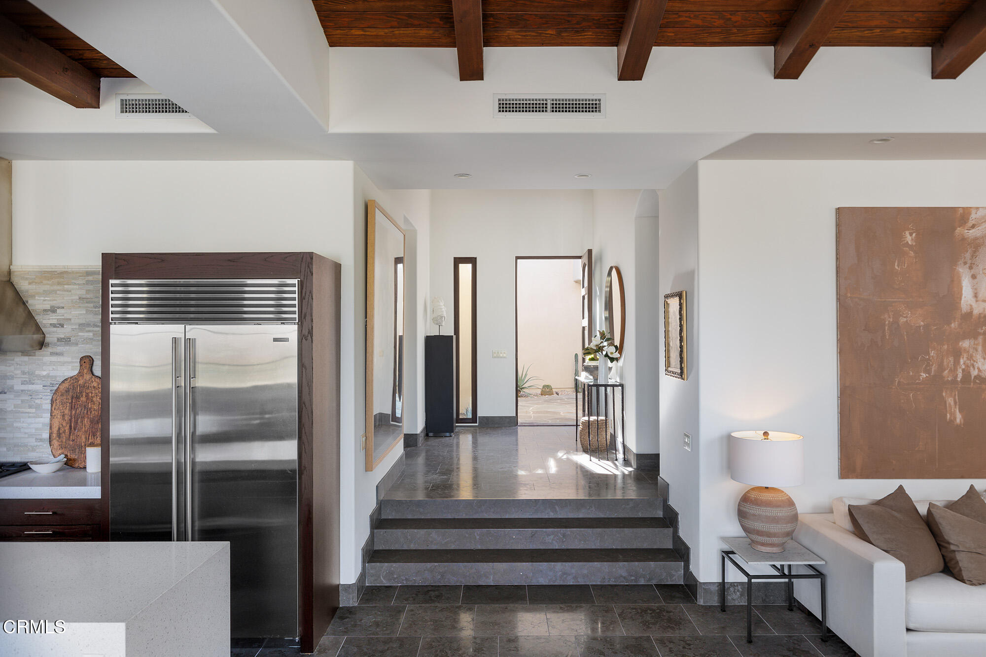 72265 Bajada Trail Palm Desert, CA 92260 - Photo 7 of 25 a living room with furniture and a fireplace