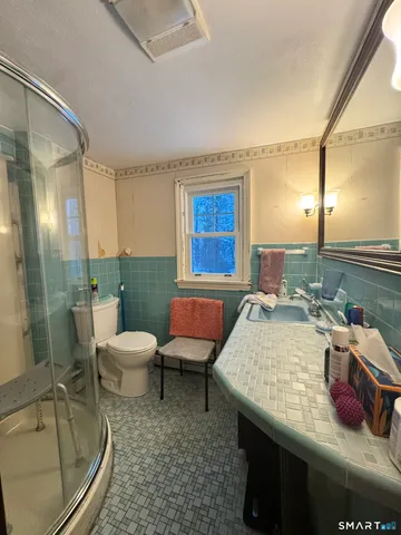 a room with table and chairs