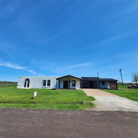 a house view with a garden space