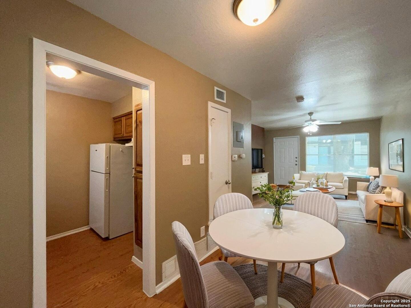 2802 Lasses Boulevard, Unit 42 San Antonio, TX 78223 - Photo 2 of 33 a view of a dining room with furniture