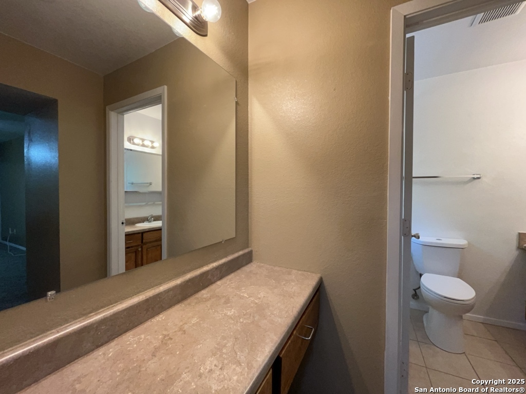 2802 Lasses Boulevard, Unit 42 San Antonio, TX 78223 - Photo 21 of 33 a view of a bathroom from a hallway