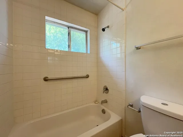 a view of a backyard of the house