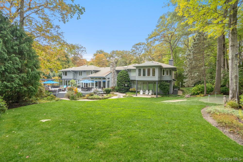 8 Forest Court Syosset, NY 11791 - Photo 36 of 40 Partial view of backyard