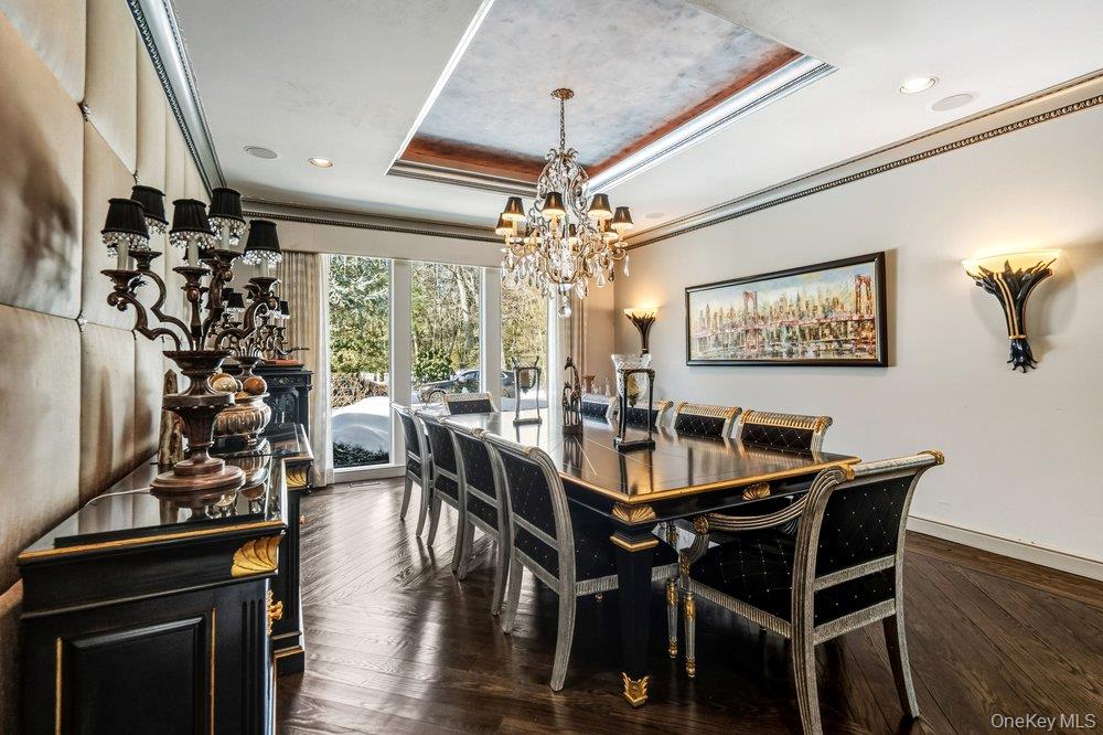 8 Forest Court Syosset, NY 11791 - Photo 7 of 40 View of dining room with moldings, tray ceiling and hardwood floor
