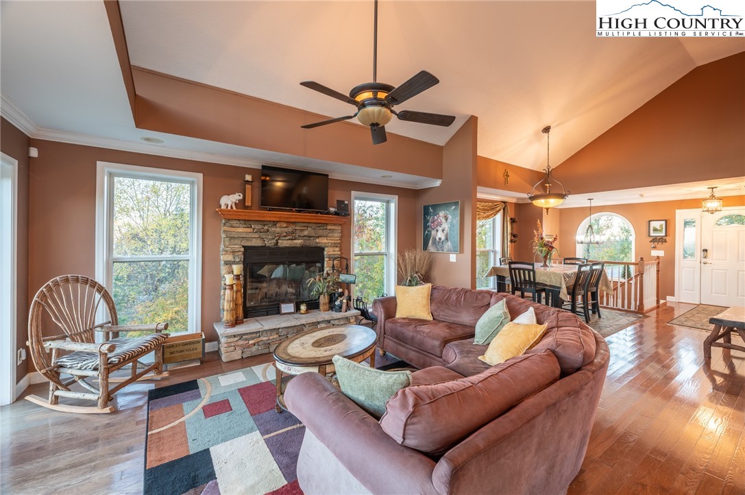 309 Pinnacle Ridge Road Beech Mountain, NC 28604 - Photo 15 of 45 a living room with furniture and a fireplace