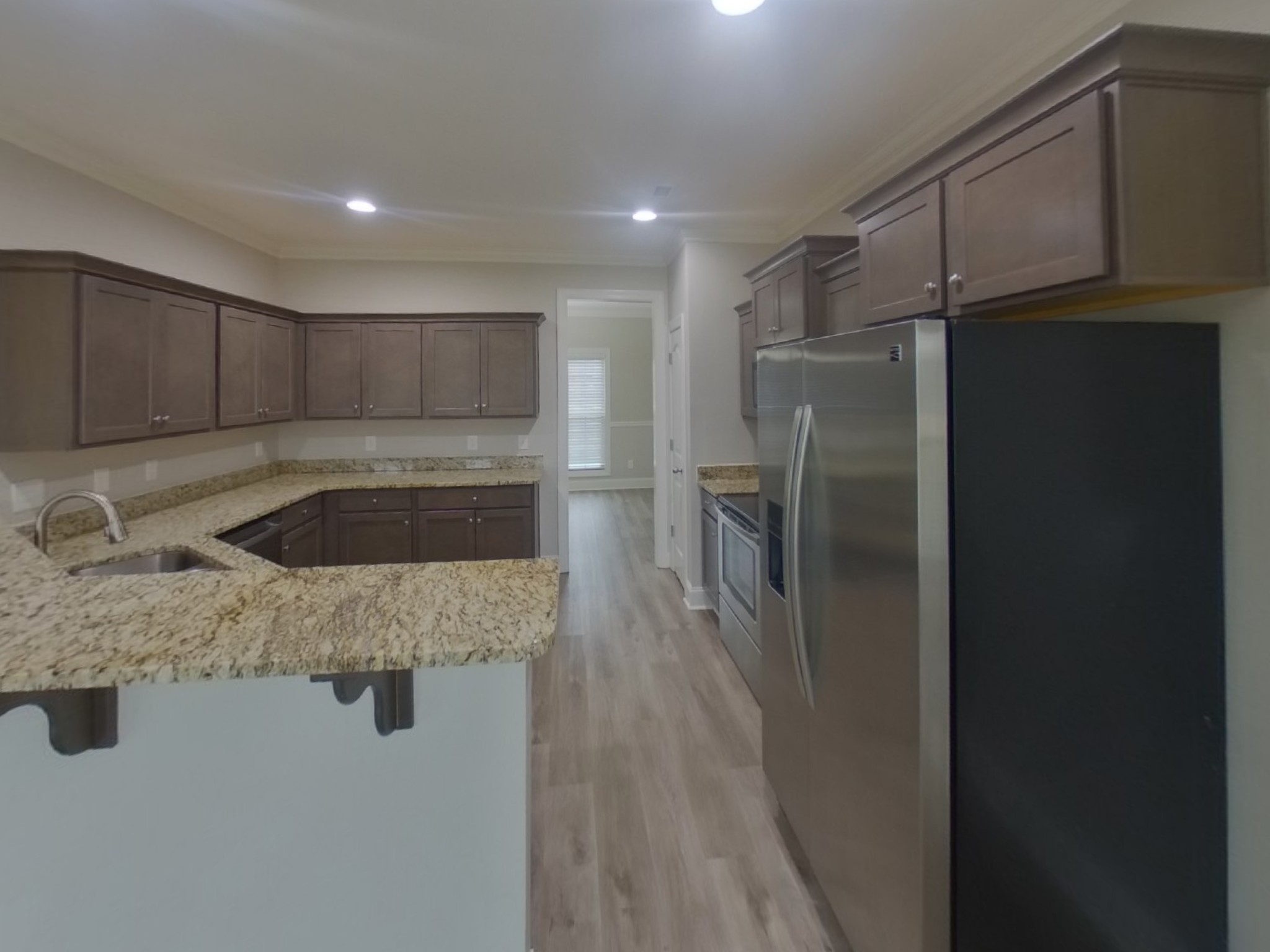 1502 John Lee Lane Murfreesboro, TN 37128 - Photo 6 of 15 a kitchen with a refrigerator sink and cabinets